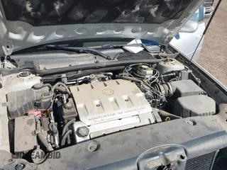 2003 Cadillac DeVille DTS z VIN 1G6KF57923U260229, wystawiony jako IAAI lot #41415468 z przebiegiem 58 012 mil mil oraz . Historia ofert i sprzedaży dostępna na DreamBid. Obrazek 10.