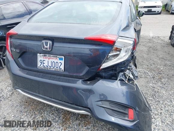 2020 Honda Civic LX z VIN 19XFC2F69LE203697, wystawiony jako IAAI lot #41608520 z przebiegiem 46 735 mil mil oraz . Historia ofert i sprzedaży dostępna na DreamBid. Obrazek 16.