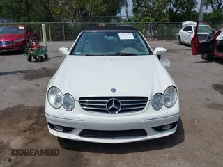 2005 Mercedes-Benz CLK 5.0L with VIN WDBTK75J55F123328, listed as a IAAI auction lot 42082590 with 58,969 mi miles. Bid and sale history available at carsss.com. Image 12.
