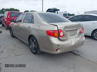 2009 Toyota Corolla with VIN 1NXBU40E99Z118081, listed as a IAAI auction lot 42086882 with 199,328 mi miles and . Bid and sale history available at DreamBid. Image 3.