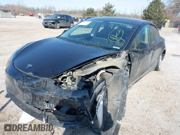 2022 Tesla Model 3 with VIN 5YJ3E1EA1NF304811, listed as a IAAI auction lot 41559342 with 29,597 mi miles and . Bid and sale history available at DreamBid. Image 6.