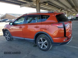 2016 Toyota RAV4 XLE with VIN 2T3RFREV4GW445197, listed as a Copart auction lot 53206365 with 114,072 mi miles and Salvage title. Bid and sale history available at DreamBid. Image 2.