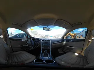 2013 Ford Fusion SE Hybrid with VIN 3FA6P0LU9DR150396, listed as a IAAI auction lot 42080329 with 195,665 mi miles. Bid and sale history available at carsss.com. Image 18.