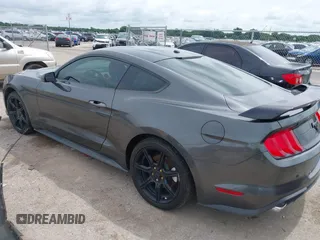 2019 Ford Mustang EcoBoost with VIN 1FA6P8TH6K5106082, listed as a IAAI auction lot 42466881 with 105,323 mi miles and . Bid and sale history available at DreamBid. Image 3.