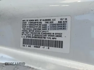 2014 Honda Odyssey Touring with VIN 5FNRL5H98EB059790, listed as a Copart auction lot 50547555 with Not Provided miles and Salvage Title. Bid and sale history available at DreamBid. Image 14.