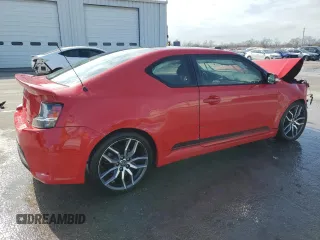 2014 Scion tC with VIN JTKJF5C76E3074921, listed as a Copart auction lot 43088455 with 230,589 mi miles and Salvage Title. Bid and sale history available at carsss.com. Image 3.