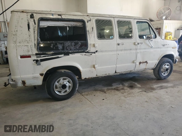 1987 Ford Econoline Cargo with VIN 1FTEE24N6HHB45016, listed as a Copart auction lot 50947745 with 62,721 mi miles and Salvage Title. Bid and sale history available at DreamBid. Image 3.