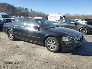 2000 Cadillac Seville Touring STS z VIN 1G6KY5495YU177352, wystawiony jako Copart lot #86020444 z przebiegiem Nie podano mil oraz Szkoda całkowita • Salvage title. Historia ofert i sprzedaży dostępna na DreamBid. Obrazek 4.