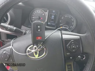 2018 Toyota Tacoma SR5 with VIN 5TFAZ5CN0JX063350, listed as a IAAI auction lot 41829396 with 61,155 mi miles and . Bid and sale history available at DreamBid. Image 11.