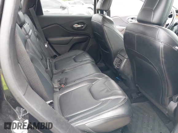 2014 Jeep Cherokee Limited with VIN 1C4PJLDS8EW104085, listed as a IAAI auction lot 42104059 with 141,951 mi miles and . Bid and sale history available at DreamBid. Image 8.