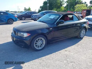 2011 BMW 1 Series 128i with VIN WBAUL7C55BVM81049, listed as a IAAI auction lot 41892811 with 50,659 mi miles and . Bid and sale history available at carsss.com. Image 18.