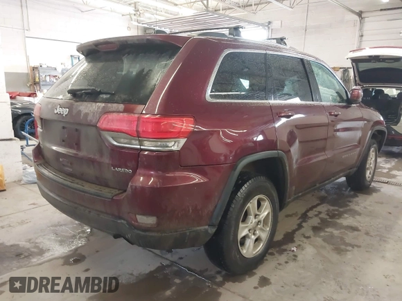 2016 Jeep Grand Cherokee Laredo z VIN 1C4RJFAG3GC471619, wystawiony jako IAAI lot #41659523 z przebiegiem 139 671 mil mil oraz . Historia ofert i sprzedaży dostępna na DreamBid. Obrazek 4.
