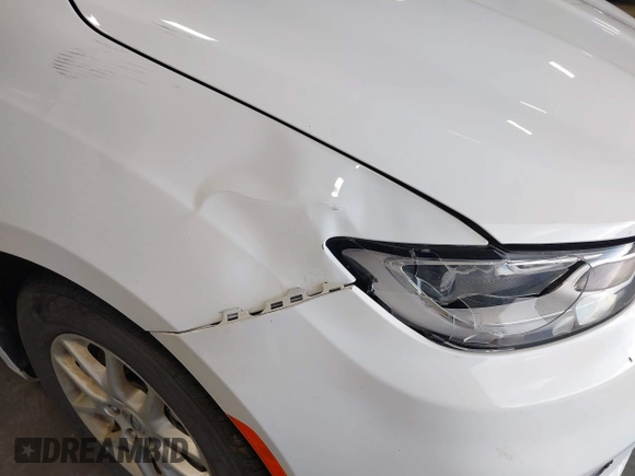 2022 Chrysler Pacifica Touring L with VIN 2C4RC1BGXNR144831, listed as a IAAI auction lot 40473026 with 36,495 mi miles and . Bid and sale history available at DreamBid. Image 17.