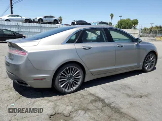 2015 Lincoln MKZ Hybrid z VIN 3LN6L2LU3FR608806, wystawiony jako Copart lot #57187835 z przebiegiem 151 462 mil mil oraz Czysty tytuł • Clean title. Historia ofert i sprzedaży dostępna na DreamBid. Obrazek 3.