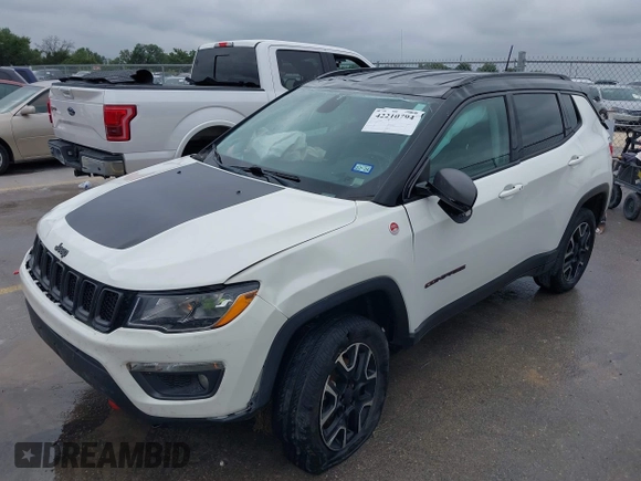 2020 Jeep Compass Trailhawk z VIN 3C4NJDDB6LT126585, wystawiony jako IAAI lot #42210794 z przebiegiem 132 220 mil mil oraz . Historia ofert i sprzedaży dostępna na DreamBid. Obrazek 6.