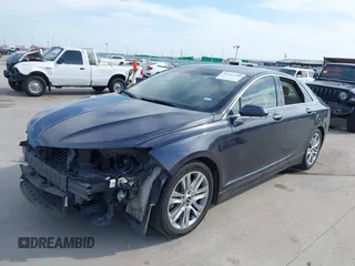 2014 Lincoln MKZ with VIN 3LN6L2GK7ER819756, listed as a IAAI auction lot 42242399 with 140,483 mi miles and . Bid and sale history available at DreamBid. Image 2.