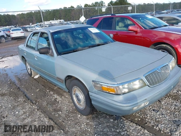 1996 Mercury Grand Marquis GS with VIN 2MELM74W7TX616694, listed as a IAAI auction lot 41216582 with 127,486 mi miles and . Bid and sale history available at DreamBid. Image 1.
