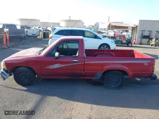 1993 Toyota 2WD Pickups DX with VIN JT4RN81P1P5162011, listed as a IAAI auction lot 41721589 with 207,489 mi miles. Bid and sale history available at carsss.com. Image 14.