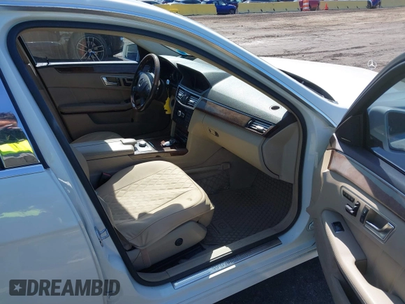 2012 Mercedes-Benz E-Class E 350 Luxury with VIN WDDHF8JB4CA651569, listed as a IAAI auction lot 41769849 with 150,074 mi miles. Bid and sale history available at carsss.com. Image 5.