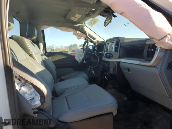2023 Ford F-150 XL with VIN 1FTMF1CB2PKG05574, listed as a Copart auction lot 49050295 with 33,563 mi miles and Salvage Title. Bid and sale history available at carsss.com. Image 8.