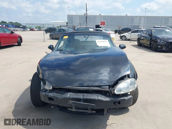 2002 Mazda MX-5 Miata Cloth with VIN JM1NB353520221312, listed as a IAAI auction lot 42410028 with 99,375 mi miles and . Bid and sale history available at DreamBid. Image 13.