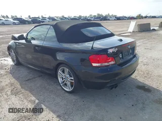 2011 BMW 1 Series 135i with VIN WBAUN7C59BVM24928, listed as a IAAI auction lot 42499931 with 94,807 mi miles and . Bid and sale history available at DreamBid. Image 3.