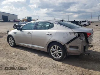 2013 Kia Optima EX with VIN 5XXGN4A74DG169946, listed as a Copart auction lot 60991295 with 147,604 mi miles and Salvage title. Bid and sale history available at DreamBid. Image 2.