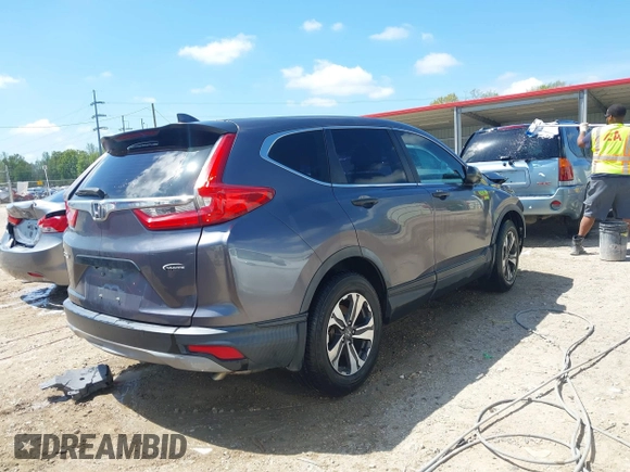 2018 Honda CR-V LX with VIN 5J6RW5H31JL000794, listed as a IAAI auction lot 41864939 with 78,694 mi miles and . Bid and sale history available at DreamBid. Image 4.