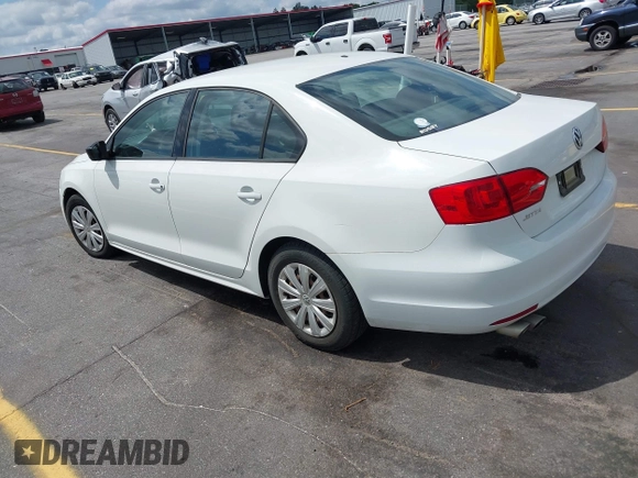 2014 Volkswagen Jetta Sedan S with VIN 3VW2K7AJ6EM334635, listed as a IAAI auction lot 42151738 with 142,923 mi miles. Bid and sale history available at carsss.com. Image 3.