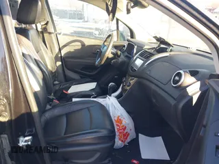 2015 Chevrolet Trax LTZ with VIN KL7CJTSB0FB151750, listed as a IAAI auction lot 41408991 with 147,349 mi miles. Bid and sale history available at carsss.com. Image 5.