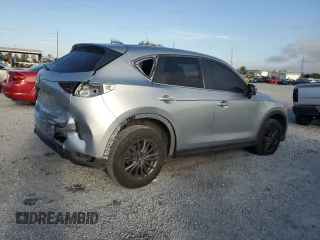 2020 Mazda CX-5 Touring with VIN JM3KFACM8L0764878, listed as a Copart auction lot 49303865 with 114,890 mi miles and Salvage Title. Bid and sale history available at carsss.com. Image 3.