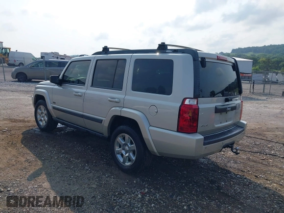 2007 Jeep Commander Sport z VIN 1J8HG48K87C696538, wystawiony jako IAAI lot #39853716 z przebiegiem 226 491 mil mil oraz . Historia ofert i sprzedaży dostępna na DreamBid. Obrazek 3.