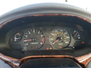 2000 Hyundai Elantra GLS z VIN KMHJF35F4YU038977, wystawiony jako Copart lot #80800144 z przebiegiem 97 373 mil mil oraz Czysty tytuł • Clean title. Historia ofert i sprzedaży dostępna na DreamBid. Obrazek 9.