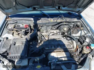 1999 Honda Civic EX with VIN 1HGEJ8643XL010821, listed as a IAAI auction lot 41602036 with 165,139 mi miles. Bid and sale history available at carsss.com. Image 10.