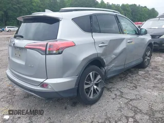 2018 Toyota RAV4 XLE with VIN 2T3WFREV4JW486939, listed as a IAAI auction lot 42355448 with 133,655 mi miles and . Bid and sale history available at DreamBid. Image 4.