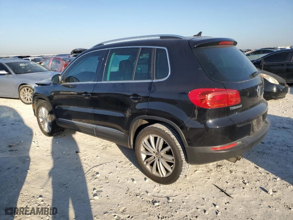 2015 Volkswagen Tiguan S with VIN WVGAV7AXXFW538149, listed as a Copart auction lot 47190425 with 128,036 mi miles and Salvage Title. Bid and sale history available at carsss.com. Image 2.