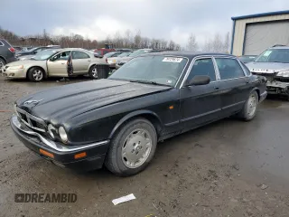 1997 Jaguar XJ with VIN SAJHX6248VC806063, listed as a Copart auction lot 79729674 with 232,571 mi miles and Salvage title. Bid and sale history available at DreamBid. Image 1.