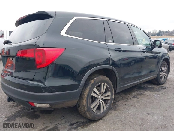 2016 Honda Pilot EX-L with VIN 5FNYF6H50GB112667, listed as a IAAI auction lot 41468703 with 166,366 mi miles. Bid and sale history available at carsss.com. Image 4.