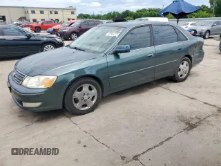 2003 Toyota Avalon XL z VIN 4T1BF28BX3U310285, wystawiony jako Copart lot #57664375 z przebiegiem 179 727 mil mil oraz Szkoda całkowita • Salvage title. Historia ofert i sprzedaży dostępna na DreamBid. Obrazek 1.