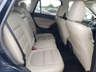 2015 Mazda CX-5 Grand Touring with VIN JM3KE4DY1F0480406, listed as a Copart auction lot 52349945 with 166,515 mi miles and Salvage Title. Bid and sale history available at carsss.com. Image 11.
