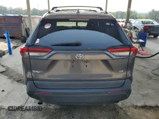 2019 Toyota RAV4 LE with VIN 2T3H1RFV7KW039271, listed as a Copart auction lot 59310205 with 132,865 mi miles and Salvage title. Bid and sale history available at DreamBid. Image 6.
