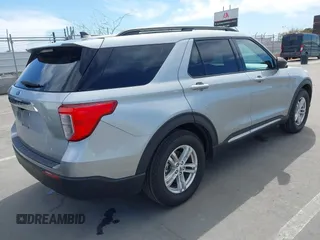 2023 Ford Explorer XLT with VIN 1FMSK7DH6PGA37708, listed as a IAAI auction lot 41996536 with 59,064 mi miles. Bid and sale history available at carsss.com. Image 4.