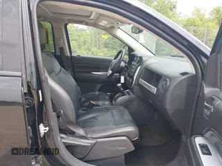 2017 Jeep Compass Latitude with VIN 1C4NJDEB7HD171563, listed as a IAAI auction lot 42669131 with 125,411 mi miles and . Bid and sale history available at DreamBid. Image 5.