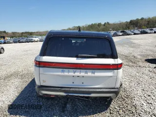 2024 Rivian R1S Adventure z VIN 7PDSGABA7RN034025, wystawiony jako Copart lot #49332795 z przebiegiem Nie podano mil oraz Szkody całkowita. Historia ofert i sprzedaży dostępna na DreamBid. Obrazek 6.