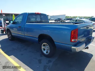 2003 Dodge Ram 1500 ST with VIN 1D7HA16KX3J529023, listed as a IAAI auction lot 42055958 with 101,872 mi miles. Bid and sale history available at carsss.com. Image 3.
