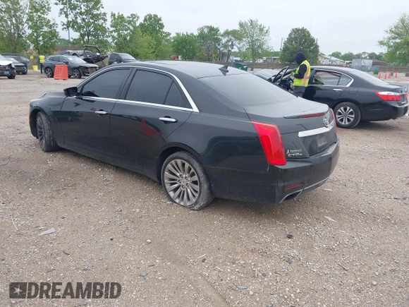 2014 Cadillac CTS Luxury AWD with VIN 1G6AX5SX9E0197395, listed as a IAAI auction lot 42211452 with 90,657 mi miles and . Bid and sale history available at DreamBid. Image 3.