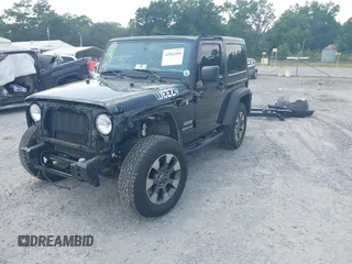 2017 Jeep Wrangler Sport z VIN 1C4AJWAG0HL618140, wystawiony jako IAAI lot #42582104 z przebiegiem 77 883 mil mil oraz . Historia ofert i sprzedaży dostępna na DreamBid. Obrazek 2.