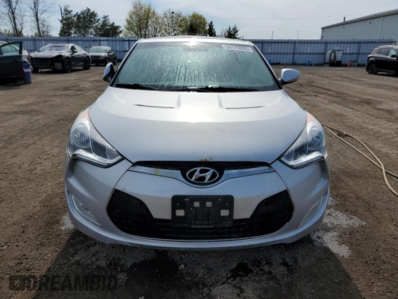 2013 Hyundai Veloster w/Black Int с VIN KMHTC6AD4DU139261, выставлен на аукционе Copart как лот 56175095 с пробегом 148 483 миль миль и Чистый • Clean title. История ставок и продаж доступна на DreamBid. Изображение 5.