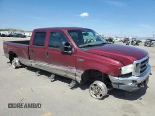 2004 Ford F-350 XL with VIN 1FTSW31P54EC27424, listed as a Copart auction lot 53072375 with 209,579 mi miles and Salvage Title. Bid and sale history available at DreamBid. Image 4.