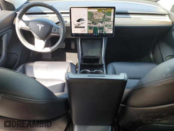 2019 Tesla Model 3 Mid Range with VIN 5YJ3E1EA0KF484178, listed as a Copart auction lot 53121915 with 64,929 mi miles and Salvage Title. Bid and sale history available at DreamBid. Image 8.